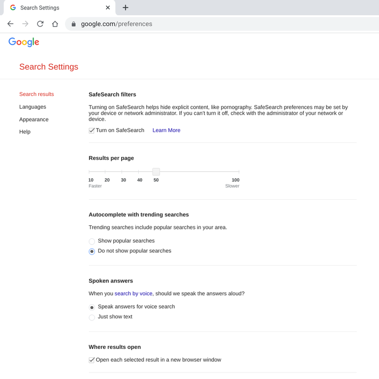 Screenshot of Google Search Settings page, with SafeSearch on, 50 results per page selected, Do not show popular searches set, and option to Open each selected result in a new browser window checked.