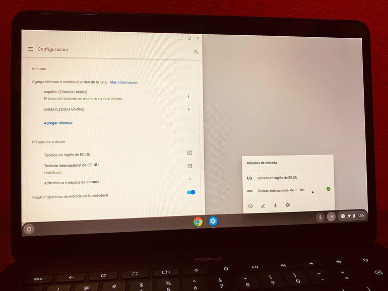 Photo of Pixelbook Go Chromebook screen and keyboard, with Language settings in Spanish displayed, and US International keyboard option selected (with input controls, lower right).