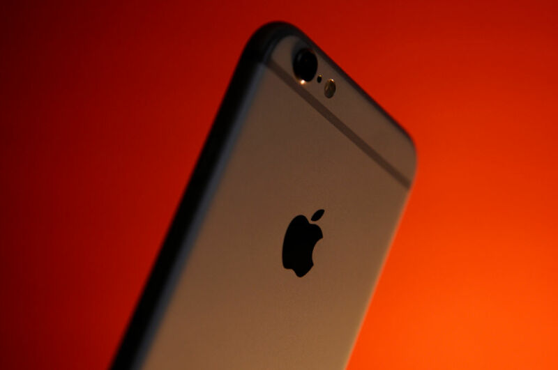 An iPhone 6 pictured from behind, showing the Apple logo.
