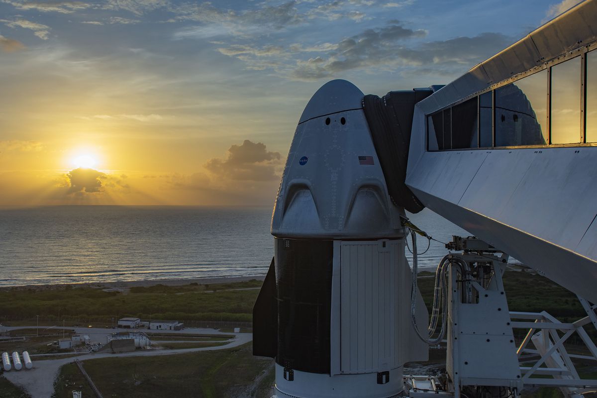 The Crew Dragon capsule sits atop the Falcon 9 rocket.