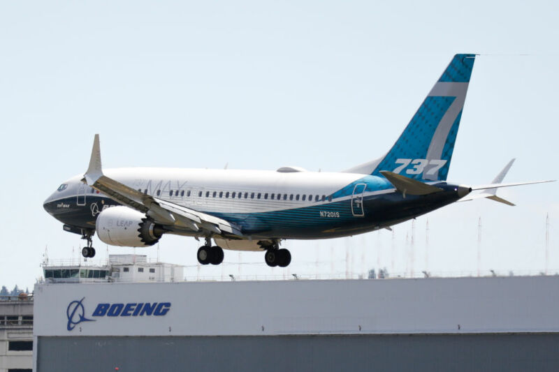 A Boeing 737 MAX jet lands following a Federal Aviation Administration (FAA) test flight at Boeing Field in Seattle, Washington, on June 29, 2020. 