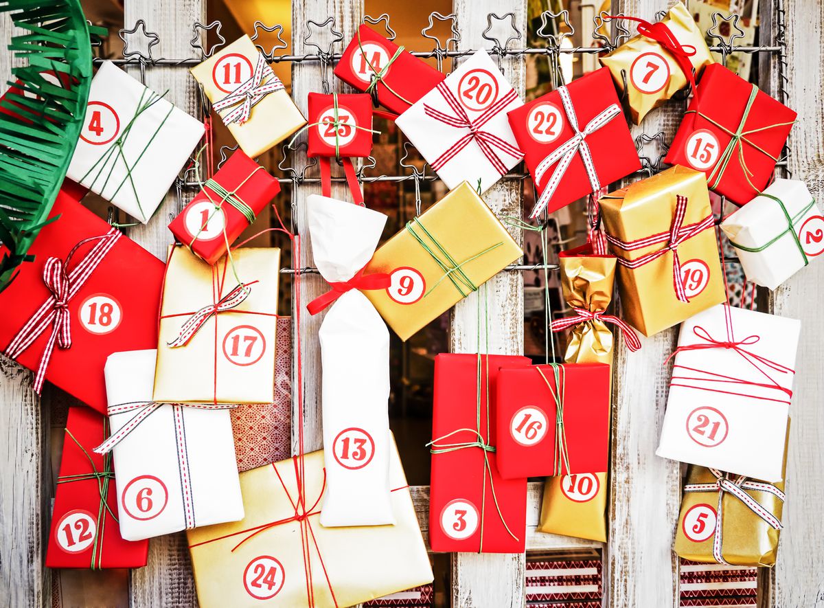 A collection of wrapped presents numbered for each of the days of Advent.