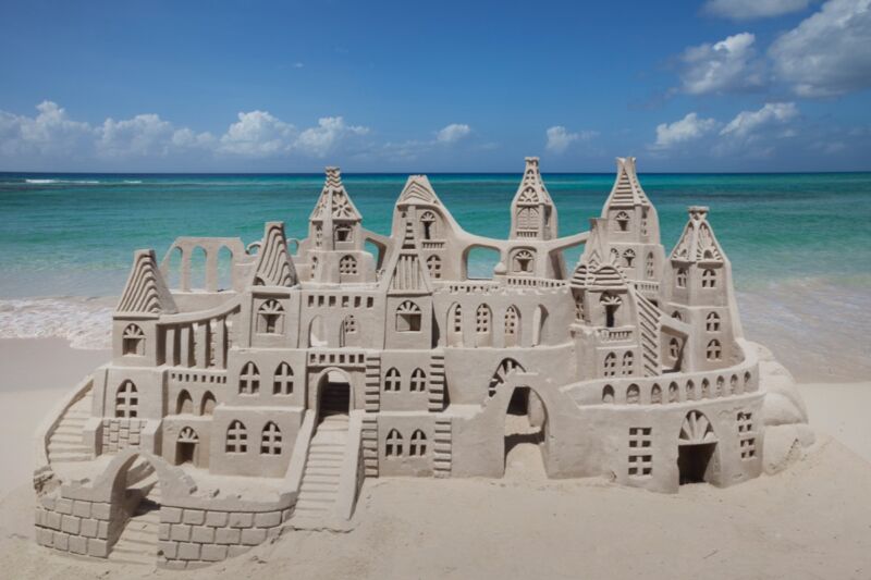 The secret to a stable sandcastle primarily lies in the right proportion of water to sand. Mathematically, the forces at play are described by the