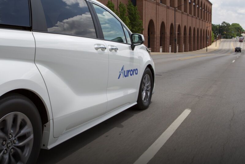 Toyota partners with startup Aurora to develop self-driving taxis
